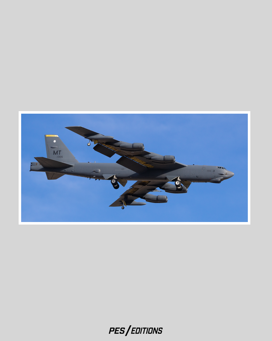 A B-52H Stratofortress from Minot AFB (MT) on approach. The heavy bomber is flying with landing gear down.